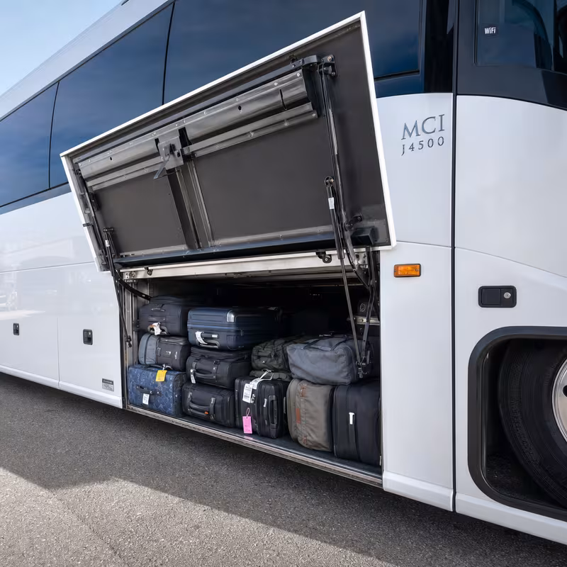 Party bus interior with wraparound leather seating and LED lighting in Indianapolis