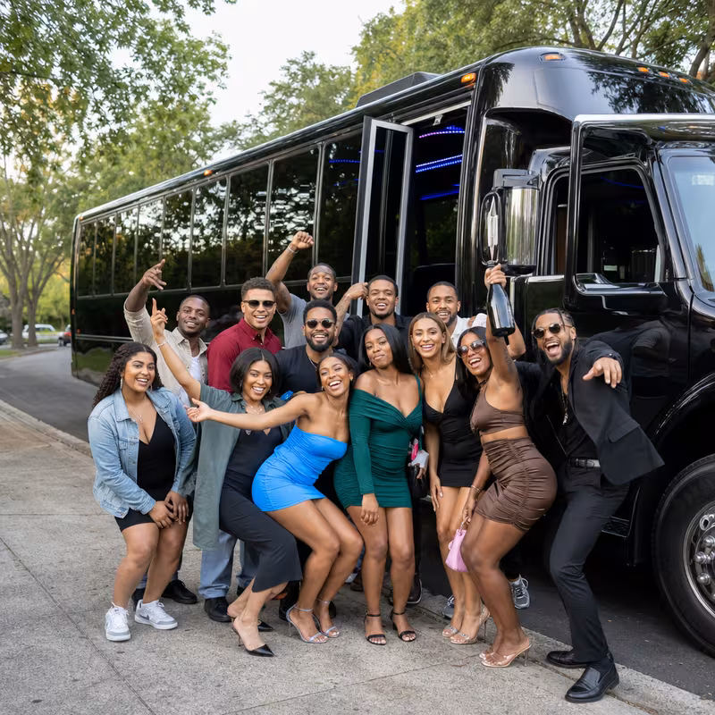 Group boarding a white charter bus for Birthday Transportation transportation in Indianapolis