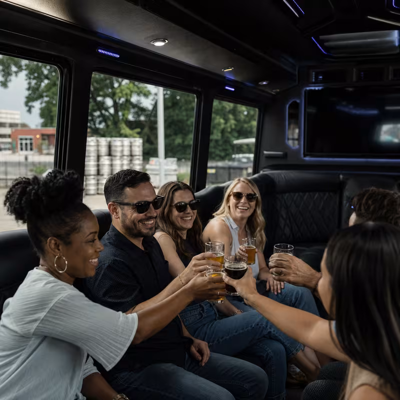 Group boarding a white charter bus for Winery & Brewery Tour Transportation transportation in Indianapolis